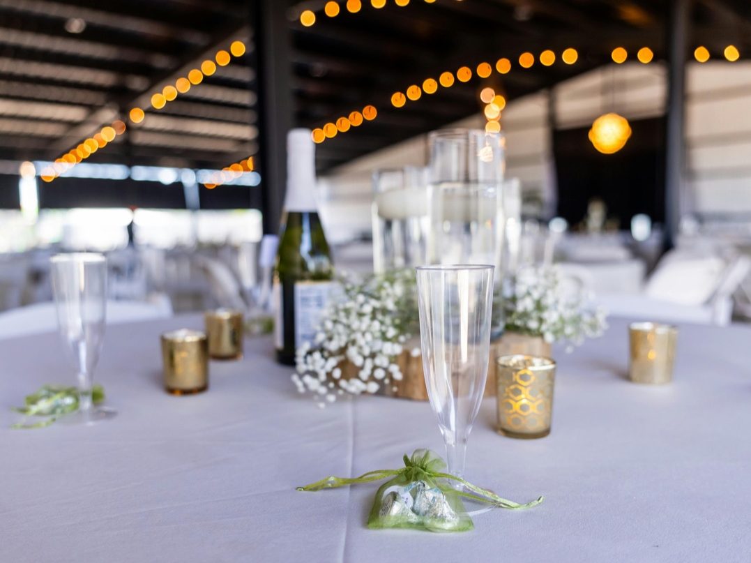 Elegantly lit wedding reception, full event planning by Gather